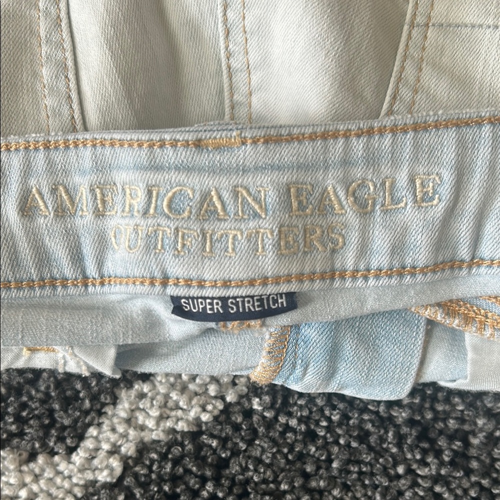 American Eagle Super Low Shortie Distressed Light Blue Denim Shorts Size 8 - Picture 3 of 4